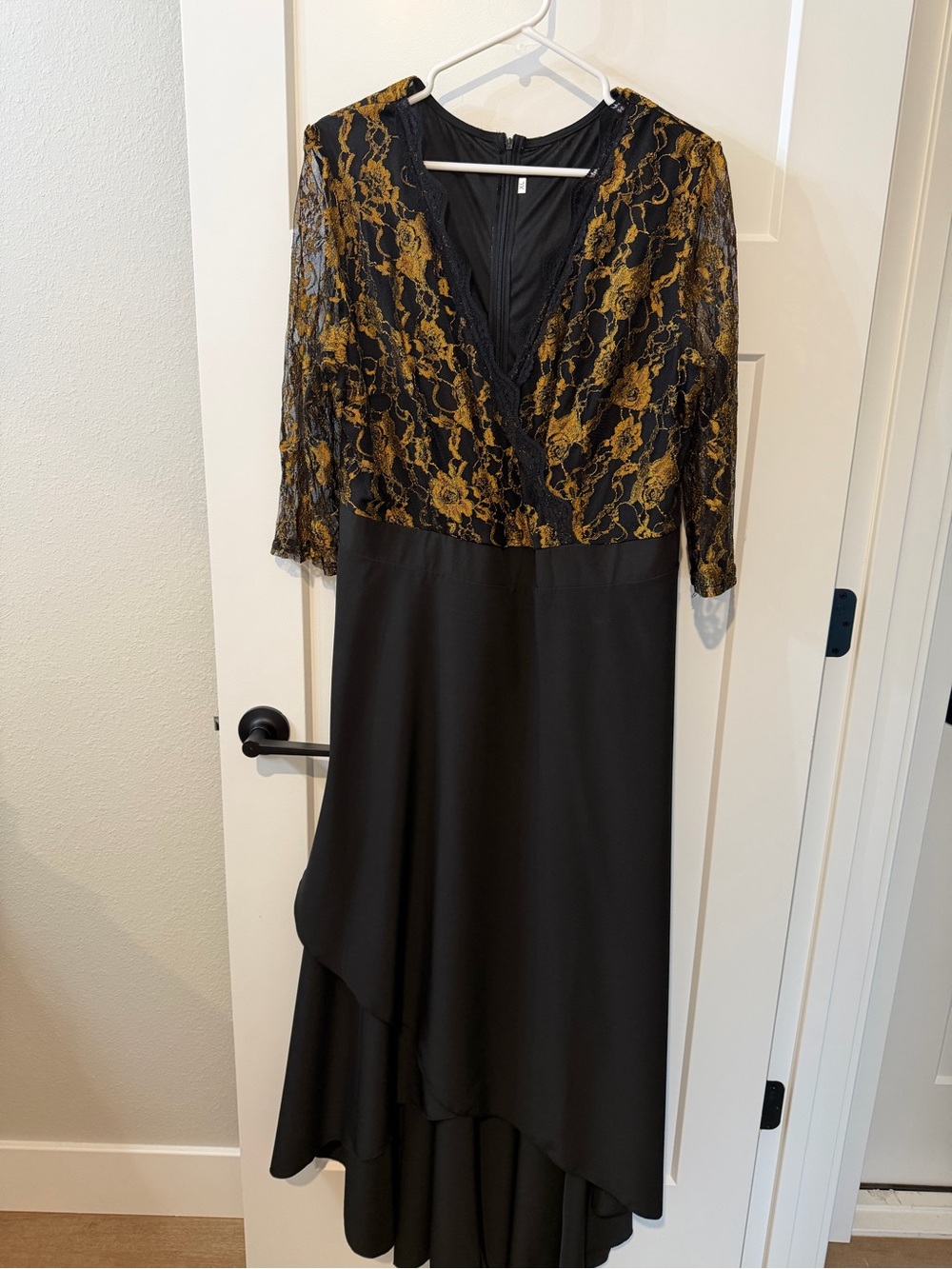 Elegant Black High-Low Dress with Gold Lace Bodice